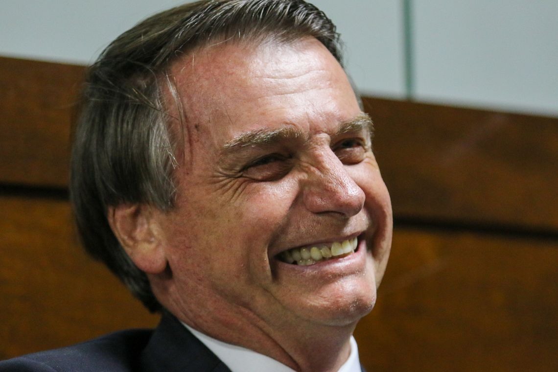 O presidente Jair Bolsonaro durante posse do presidente da Embratur, Gilson Machado Neto.  