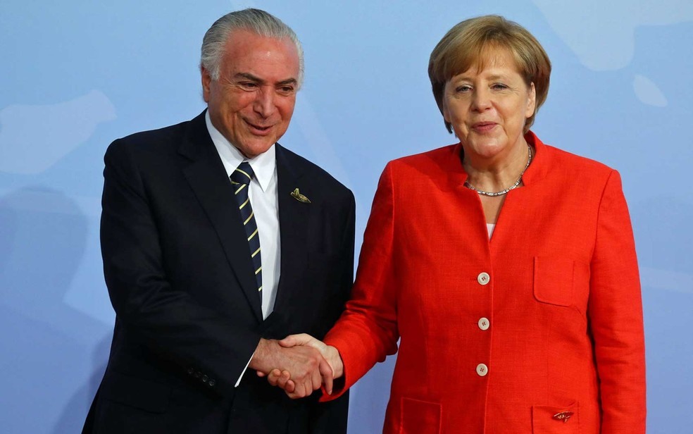 Michel Temer e a chanceler alemã Angela Merkel (Foto: Kai Pfaffenbach / Reuters)