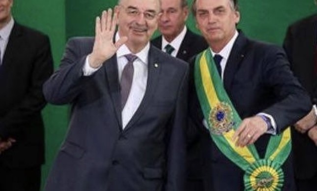 O deputado federal Osmar Terra e o presidente Jair Bolsonaro